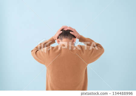 Suffering troubled senior man behind you 134488996