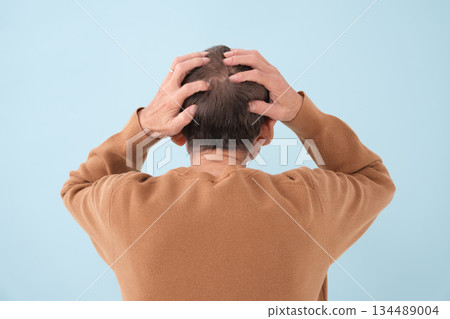 Suffering troubled senior man behind you 134489004