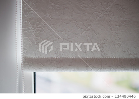 Roll Blinds on the window Roll Blinds on the window 134490446