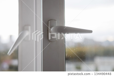 handles opened plastic window. handles opened plastic window. 134490448