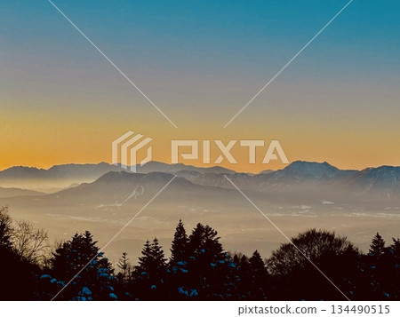 The Northern Alps mountain range floating in the sunset The Northern Alps mountain range floating in the sunset 134490515