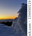 Sun setting over the snow 134490519