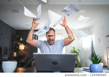 Frustrated middle aged Caucasian man working at home 134490885