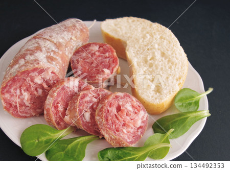 Sliced Italian salami, salami sausage, salami, sausage 134492353
