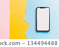 Smartphone with blank screen on pastel split background 134494488
