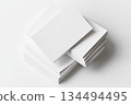 Blank white paper stack on white background 134494495
