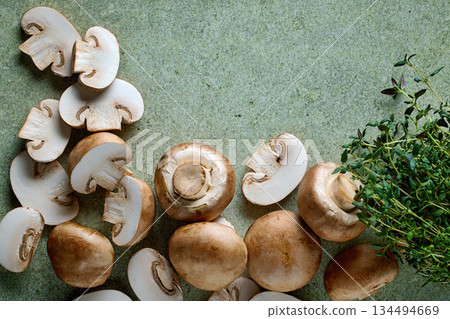 fresh mushrooms on green background 134494669