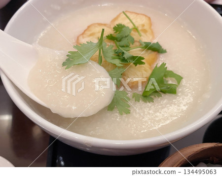 Soy Milk Porridge: A healthy Chinese-style porridge made with soy milk. 134495063
