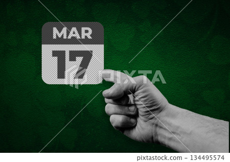 St. Patrick Day calendar, March 17. Halftone collage: a hand pointing to a calendar with the date March 17. St. Patrick Day calendar, March 17. Halftone collage: a hand pointing to a calendar with the date March 17. 134495574