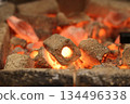 Burning charcoal 134496338