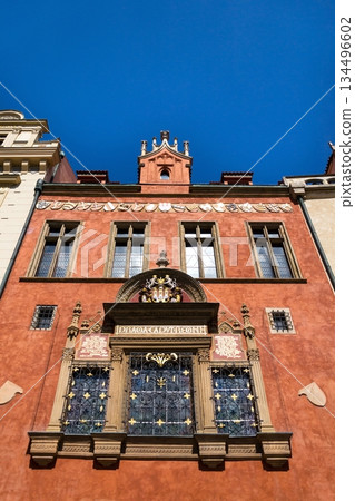 Renaissance tripartite window on Prague Old Town Hall featuring the Latin inscription Praga caput regni and the Old Town coat of arms on a historic stone facade, Prague, Czech republic Renaissance tripartite window on Prague Old Town Hall featuring the Latin inscription Praga caput regni and the Old Town coat of arms on a historic stone facade, Prague, Czech republic 134496602