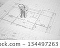 House keys . Architectural plan of the house. Construction of a house. 134497263