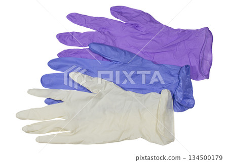 Colored medical latex gloves on a white background Colored medical latex gloves on a white background 134500179