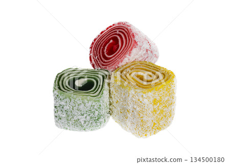 Colored rolls of delicious rahat-lokum on a white background Colored rolls of delicious rahat-lokum on a white background 134500180