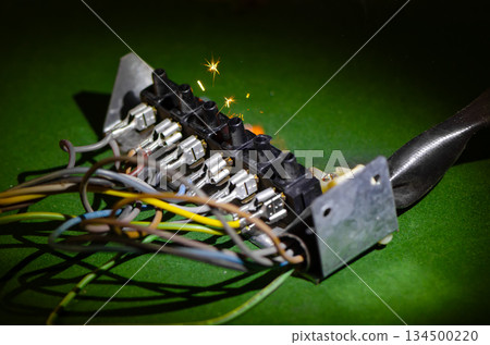 Sparks fly out of the terminal block when electrical connections are disrupted. Sparks fly out of the terminal block when electrical connections are disrupted. 134500220