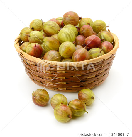 Juicy Green and Red Gooseberries in Woven Basket Shot in Studio with White Background Juicy Green and Red Gooseberries in Woven Basket Shot in Studio with White Background 134500337