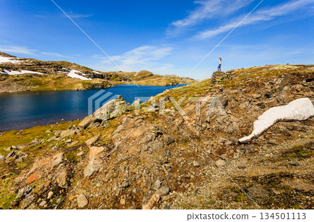 Tourist enjoying landscape norwegian nature 134501113