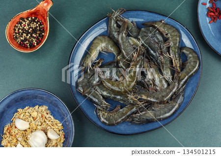 Raw scampi langoustines ready for cooking. Raw scampi langoustines ready for cooking. 134501215