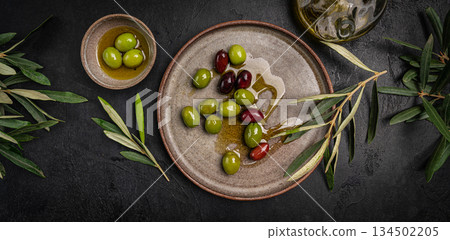 Green and black olives 134502205