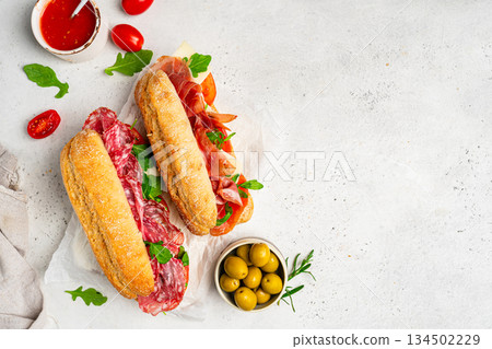 Assorted delicious baguette sandwiches Assorted delicious baguette sandwiches 134502229