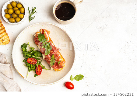 Grilled toast with jamon or prosciutto Grilled toast with jamon or prosciutto 134502231