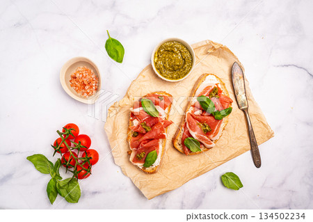 Grilled toast with jamon or prosciutto 134502234