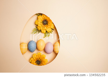 Top view pastel beige background with Easter decor 134502235