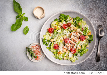 Caesar salad with chicken 134502248