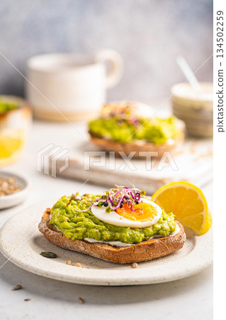 Toast with avocado 134502259