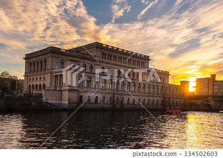 Building of Koenigsberg stock exchange on Pregola river at sunset. Kaliningrad. Russia 134502603