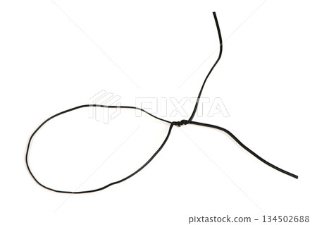 Black insulated wire loop with knot isolated on white 134502688