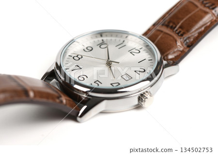 Elegant silver men's wrist watch with brown leather strap isolated on white Elegant silver men's wrist watch with brown leather strap isolated on white 134502753