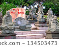 Stone sculptures of Buddhist monks in Nanshan Park, China. General view, daytime, summer 134503473