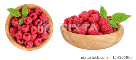 Ripe raspberries in wooden bowl isolated on a white background. Top view. Flat lay Ripe raspberries in wooden bowl isolated on a white background. Top view. Flat lay 134505903