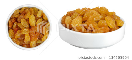 Yellow Raisins in ceramic bowl isolated on white background. Top view. Flat lay Yellow Raisins in ceramic bowl isolated on white background. Top view. Flat lay 134505904