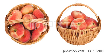 chinese flat donut peaches in a wicker basket isolated on white background. Top view. Flat lay 134505906