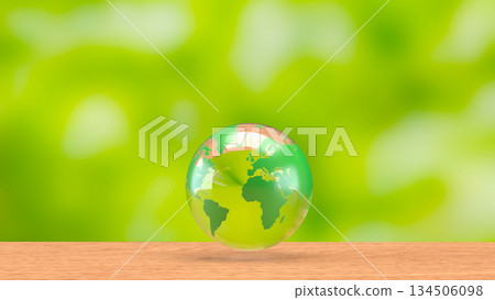 Transparent Green Earth Globe on Wooden Surface with Fresh Eco Background 3d render. 134506098