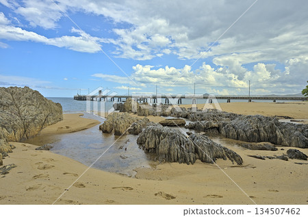 Beach view near Palm Cove Jetty with rocks 134507462