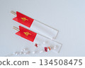 Celebratory chopsticks in a red and white chopstick bag and New Year's decorations 134508475