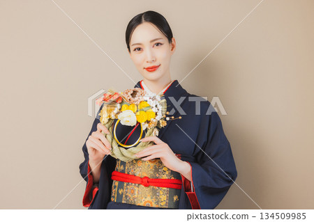 A woman in a kimono 134509985