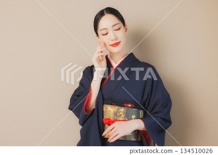 A woman in a kimono 134510026