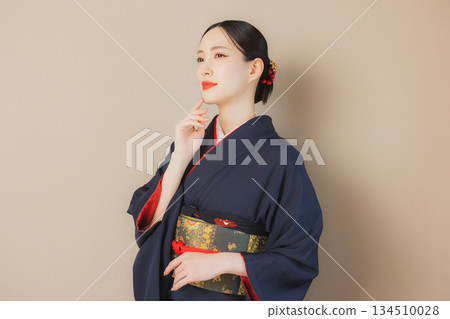 A woman in a kimono A woman in a kimono 134510028