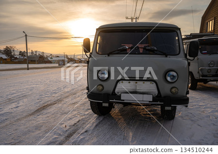 The Russian UAZ van parking in Khuzhir village a small village on Olkhon Island, Russia. Russian UAZ is popular vehicle for ruggedness in the harsh environs of Russia. The Russian UAZ van parking in Khuzhir village a small village on Olkhon Island, Russia. Russian UAZ is popular vehicle for ruggedness in the harsh environs of Russia. 134510244