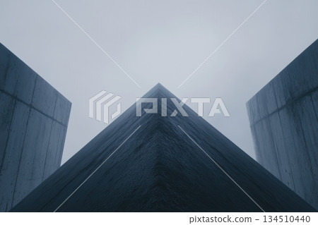 Unique architectural design showcasing a pyramid shape in a foggy environment 134510440