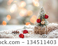 Small Christmas tree and decorations 134511403