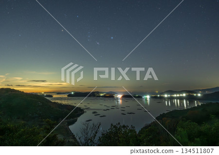 A beautiful winter starry sky over the sea in Setouchi City, Okayama Prefecture, Japan 134511807