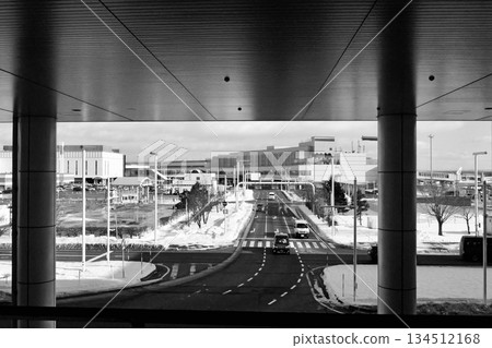 New Chitose Airport in winter, seen from the International Terminal towards the Domestic Terminal (black and white) New Chitose Airport in winter, seen from the International Terminal towards the Domestic Terminal (black and white) 134512168