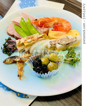 Traditional New Year's dishes served on a plate Traditional New Year's dishes served on a plate 134512472