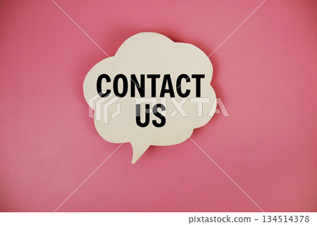 Contact Us text with speech bubble top view on pink background Contact Us text with speech bubble top view on pink background 134514378