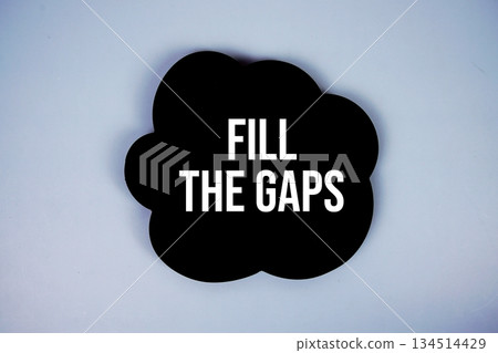 Fill the Gaps text with speech bubble on blue background 134514429